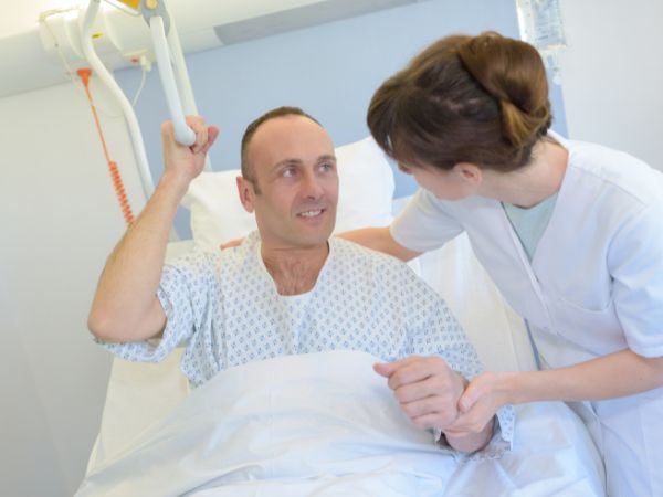 Patient lifts being used for bedridden patients